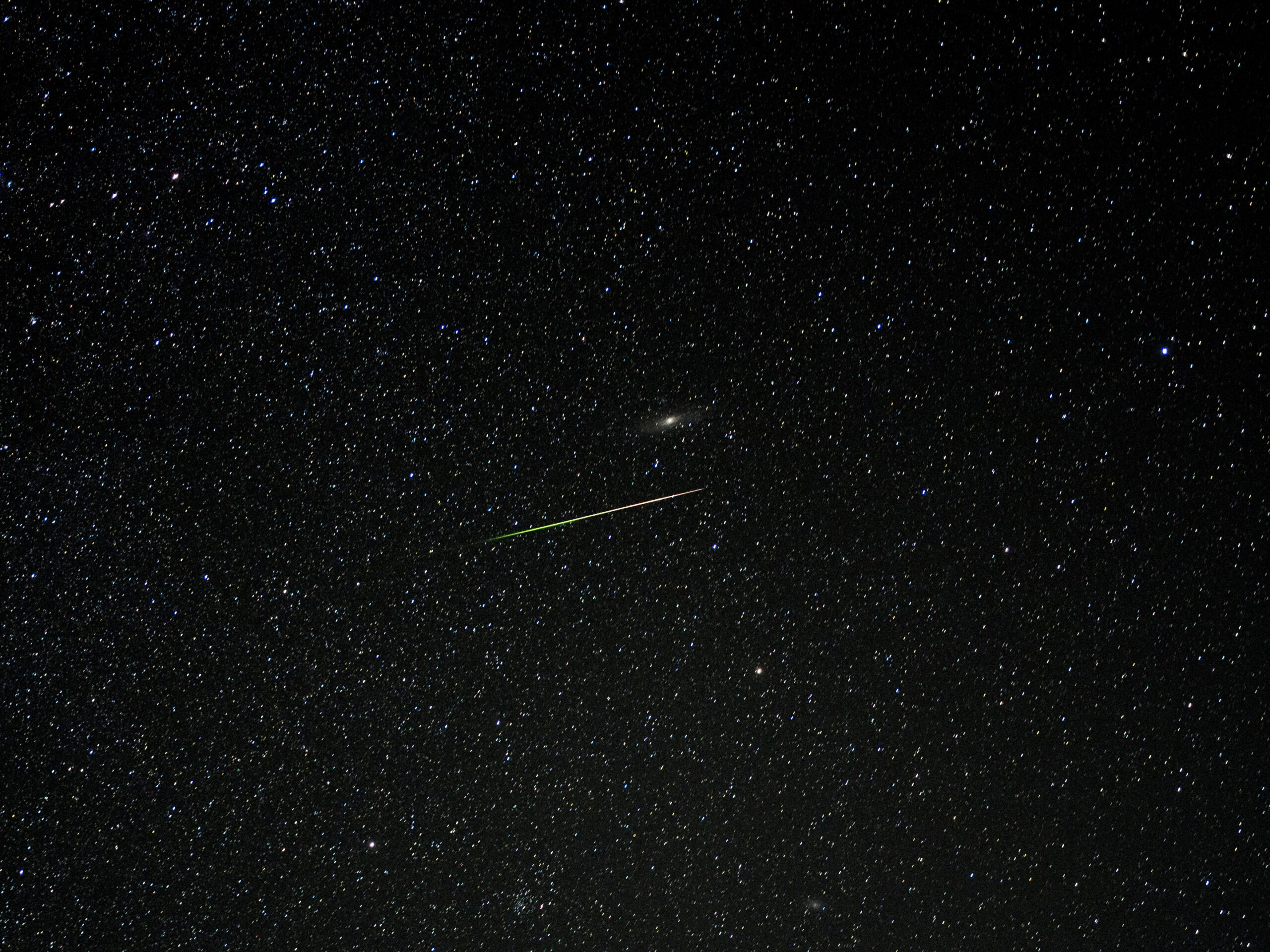 Bright Perseid meteor passing beneath the Andromeda Galaxy
