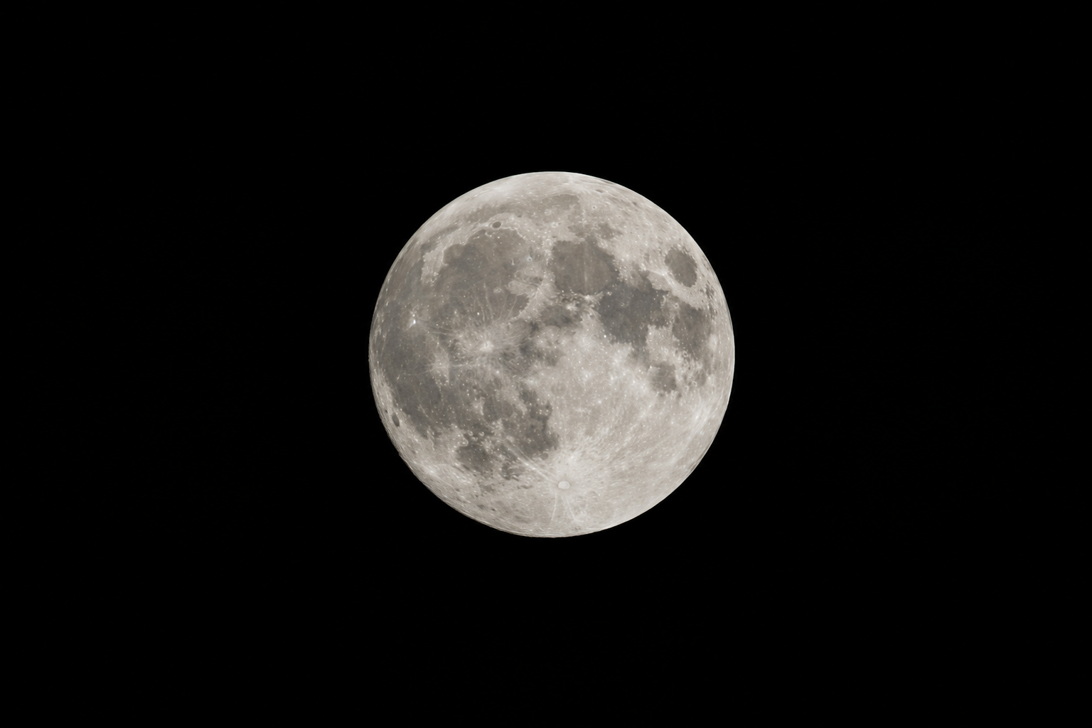 A wider view of the Moon showing the major lunar maria and brighter highlands.