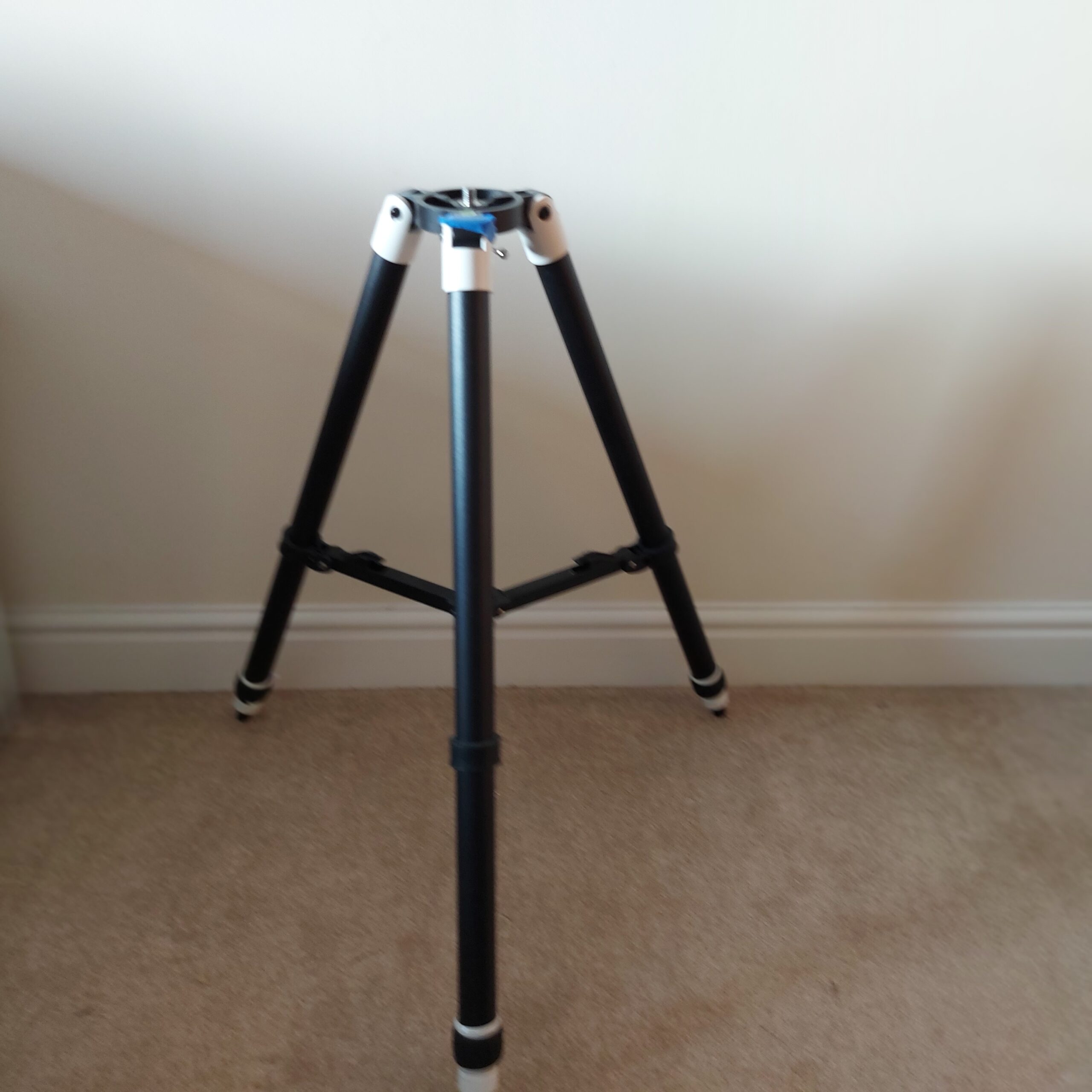 Sky-Watcher tripod used to support the Star Adventurer 2i astrophotography setup.