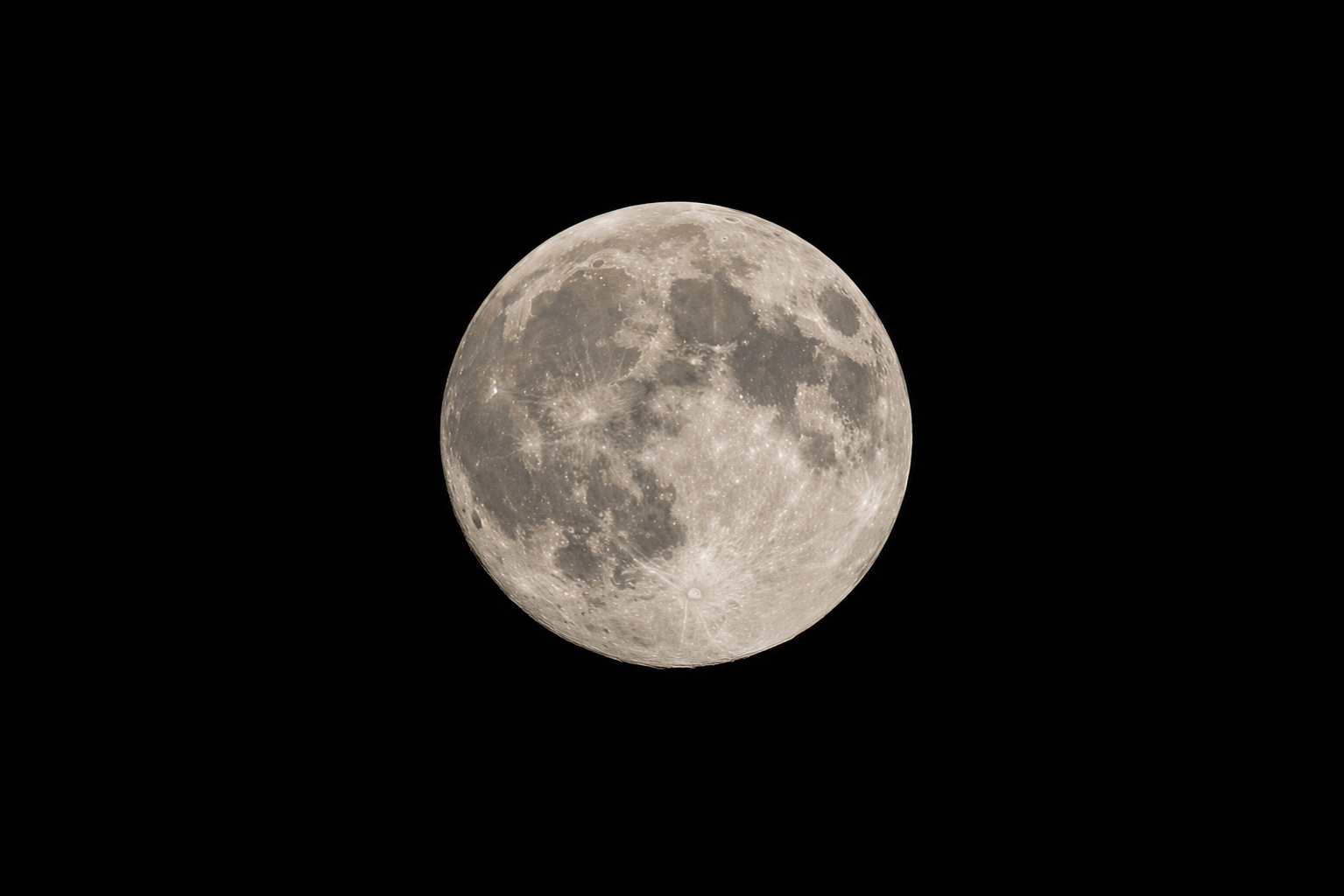 Detailed photograph of the Moon showing craters, maria and bright highlands.