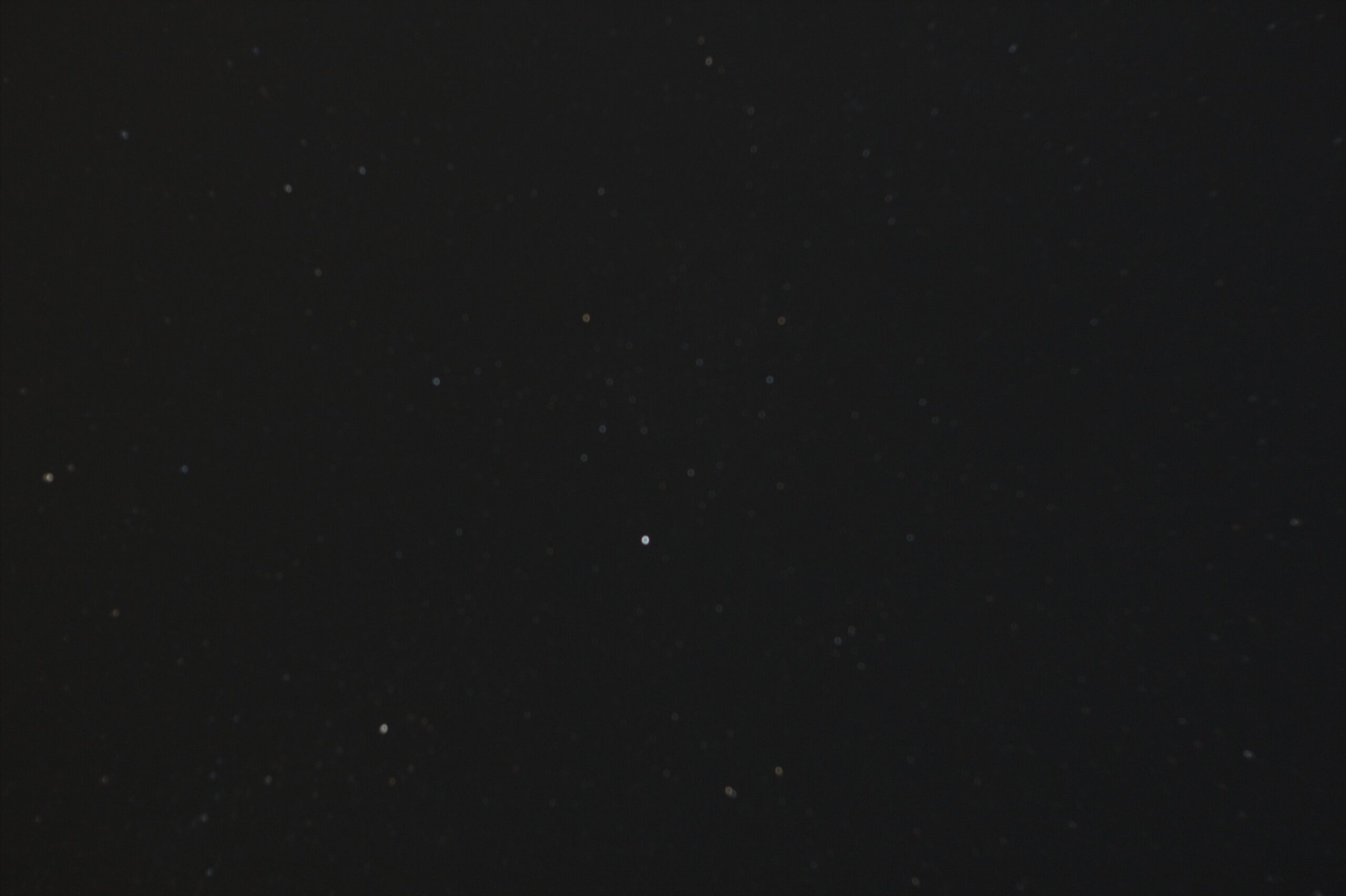 An early astrophotography attempt showing stars out of focus.